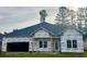 New construction home in progress with modern design elements at 277 Waterfall Circle, Little River, SC 29566