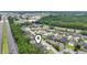 This aerial view showcases the neighborhood's location, with convenient access to major roads and lush surroundings at 297 Waterfall Circle, Little River, SC 29566