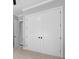 White double closet doors with black hardware at 297 Waterfall Circle, Little River, SC 29566