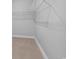 Walk in closet with shelving and carpeting at 297 Waterfall Circle, Little River, SC 29566