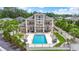 This luxurious home features a private backyard pool, patio and beautiful architecture and landscaping at 297 Waterfall Circle, Little River, SC 29566