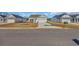 Attractive single-Gathering home featuring white siding, a two-car garage, and a well-manicured front lawn at 329 Palmetto Sand Loop, Conway, SC 29527