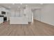 View of living room and kitchen with modern cabinets and an eat-in bar at 329 Palmetto Sand Loop, Conway, SC 29527
