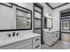 Modern bathroom with white vanity, black fixtures, and a walk-in shower at 3880 Murrells Inlet Rd., Murrells Inlet, SC 29576