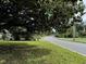 Residential street lined with trees and homes at 704 9Th Ave. S, Myrtle Beach, SC 29577