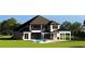 Inviting backyard features a covered patio, balcony, and luxurious pool at 372 Chamberlin Rd., Myrtle Beach, SC 29588