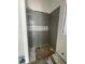 A modern shower features stylish vertical tiling and a decorative inlay, creating a spa-like experience at 372 Chamberlin Rd., Myrtle Beach, SC 29588