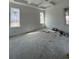 This is a bedroom with three large windows allowing ample natural light into the spacious area at 372 Chamberlin Rd., Myrtle Beach, SC 29588
