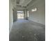 Unfinished living room featuring recessed ceiling, neutral walls, and large windows at 372 Chamberlin Rd., Myrtle Beach, SC 29588