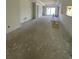 Unfinished living room featuring recessed ceiling, neutral walls, and large windows at 372 Chamberlin Rd., Myrtle Beach, SC 29588