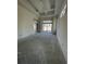 Unfinished living room featuring recessed ceiling, neutral walls, and large windows at 372 Chamberlin Rd., Myrtle Beach, SC 29588