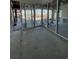 A well-lit sunroom features multiple sliding glass doors that provide access and bring natural light inside at 372 Chamberlin Rd., Myrtle Beach, SC 29588