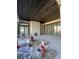 Covered patio features a brick fireplace and large sliding glass doors for seamless indoor-outdoor living at 372 Chamberlin Rd., Myrtle Beach, SC 29588