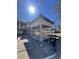 New pool house under construction with exposed beams and a bright, sunny sky overhead at 372 Chamberlin Rd., Myrtle Beach, SC 29588