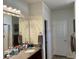Bathroom featuring single vanity with granite countertop, and large mirror at 408 Stevia Ct., Conway, SC 29526