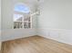 Bright and airy dining room featuring large windows, custom trim, and hardwood floors at 9048 Abingdon Dr., Myrtle Beach, SC 29579