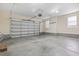 Spacious two-car garage with ample room for storage and parking with an automatic door and a window at 9048 Abingdon Dr., Myrtle Beach, SC 29579