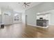 Open-concept living room featuring light wood floors, high ceilings, and plenty of natural light at 9048 Abingdon Dr., Myrtle Beach, SC 29579