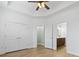 Spacious main bedroom featuring tray ceiling, double door closet, and en-suite bathroom at 9048 Abingdon Dr., Myrtle Beach, SC 29579
