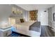 Modern bedroom with stylish furnishings, elegant art, and warm, inviting decor at 1501 S Ocean Blvd. # 240, Myrtle Beach, SC 29577