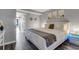 Spacious bedroom features a comfortable king-size bed, hardwood floors, and minimalist artwork at 1501 S Ocean Blvd. # 240, Myrtle Beach, SC 29577