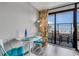 Bright dining area with access to a balcony overlooking the beach, complete with a modern table set at 1501 S Ocean Blvd. # 240, Myrtle Beach, SC 29577