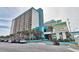 Large, beachfront resort featuring a pool, palm trees, and on-site parking at 1501 S Ocean Blvd. # 240, Myrtle Beach, SC 29577