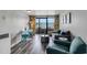 Light-filled living room with balcony and ocean view, furnished with a sofa, chairs, and dining area at 1501 S Ocean Blvd. # 240, Myrtle Beach, SC 29577