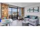 Inviting living room with balcony access and ocean views, featuring comfortable seating and modern decor at 1501 S Ocean Blvd. # 240, Myrtle Beach, SC 29577