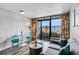 Cozy living area featuring a balcony with ocean views, a dining table and comfortable seating at 1501 S Ocean Blvd. # 240, Myrtle Beach, SC 29577