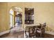 Inviting bar area featuring a marble countertop, rich wood cabinetry, and comfortable seating at 1549 Serena Dr., Myrtle Beach, SC 29579