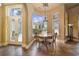 Charming breakfast nook bathed in natural light offers views of the manicured backyard at 1549 Serena Dr., Myrtle Beach, SC 29579
