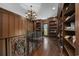 Hallway with built-in bookshelves and decorative iron railing at 1549 Serena Dr., Myrtle Beach, SC 29579