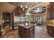 Gourmet kitchen featuring island, stainless appliances, and open-concept flow to living spaces at 1549 Serena Dr., Myrtle Beach, SC 29579