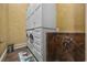 Convenient laundry room with washer, dryer, storage and a pet washing station at 1549 Serena Dr., Myrtle Beach, SC 29579
