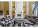 Inviting living room with fireplace, columns, and comfortable seating arrangements at 1549 Serena Dr., Myrtle Beach, SC 29579