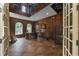Luxurious office with wood paneling, tile floors, and iron staircase at 1549 Serena Dr., Myrtle Beach, SC 29579