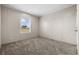 Simple bedroom with carpeted floor and a window with a view at 215 Eva Dr., Loris, SC 29569