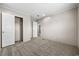 Bright bedroom with carpeted floor and closet, plus additional access at 215 Eva Dr., Loris, SC 29569