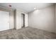 Well-lit bedroom with carpeted floor, closet, and an additional door at 215 Eva Dr., Loris, SC 29569