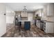 Open concept kitchen with island and stainless steel appliances at 215 Eva Dr., Loris, SC 29569