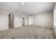 Large main bedroom with carpet, walk-in closet, and access to bathroom at 215 Eva Dr., Loris, SC 29569
