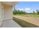 Backyard features a concrete patio with views of the surrounding land at 7913 E Highway 19, Loris, SC 29569