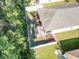 Aerial view of a fenced yard with patio, perfect for outdoor entertaining, and a lush green lawn at 149 Harmony Ln., Myrtle Beach, SC 29588