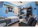 Bedroom with blue walls, desk, and bed plus Pittsburgh Steelers decorations throughout at 149 Harmony Ln., Myrtle Beach, SC 29588