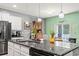 Close-up of kitchen island featuring dark countertops and white cabinets at 149 Harmony Ln., Myrtle Beach, SC 29588