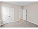 Spacious carpeted bedroom with double doors perfect for creating a serene retreat at 5032 Cambria Ct., Little River, SC 29566