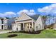 Well-maintained single Gathering home with pristine landscaping and beautiful architectural details at 5032 Cambria Ct., Little River, SC 29566