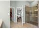 Clean bathroom with tile flooring, glass enclosed shower, and easy access to main bedroom at 621 Elgin Ct., Myrtle Beach, SC 29579