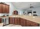 Bright kitchen features stainless steel appliances, wood cabinets and countertops, blending style with functionality at 621 Elgin Ct., Myrtle Beach, SC 29579